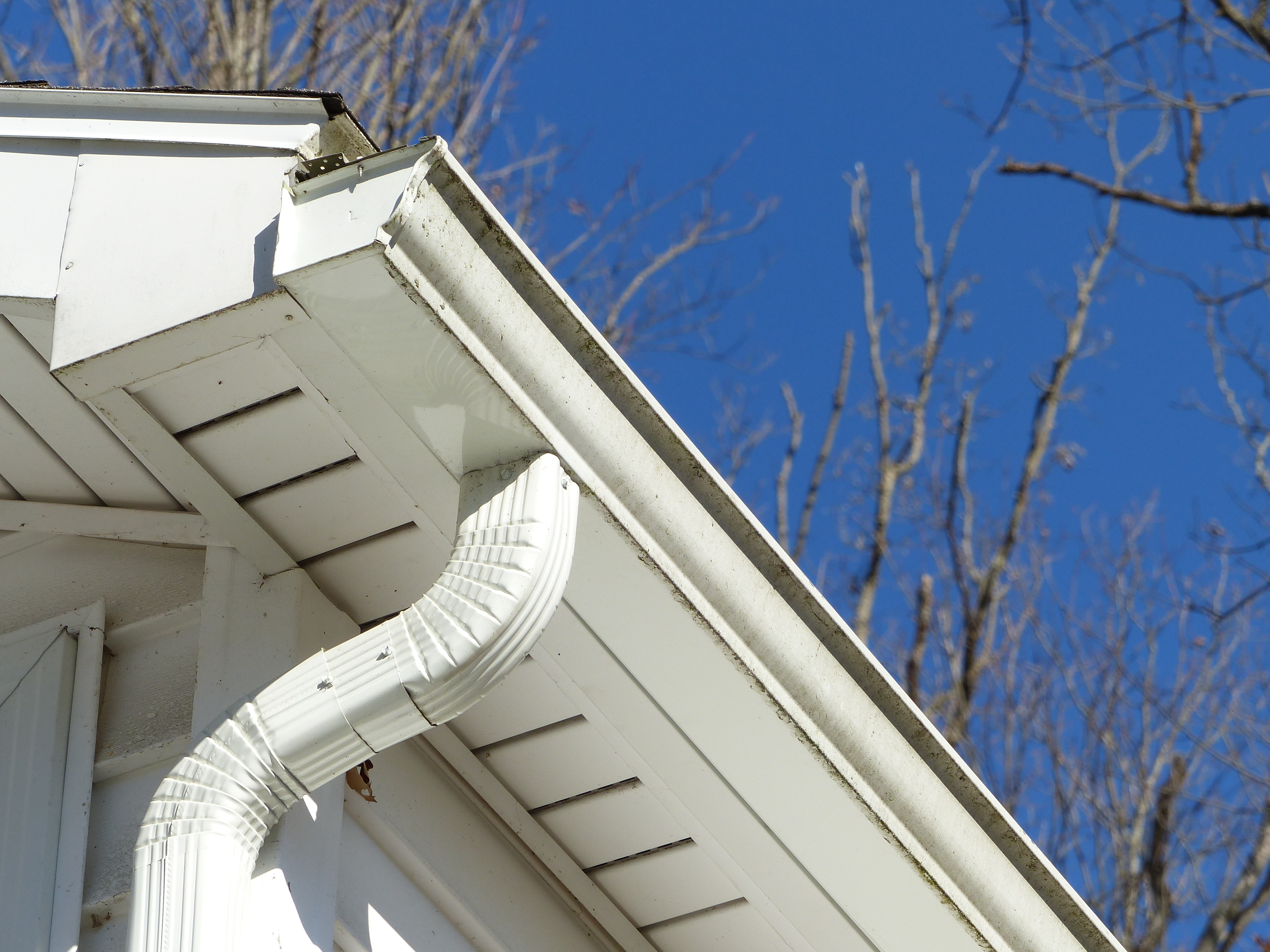 Seamless aluminum gutters installed on a home